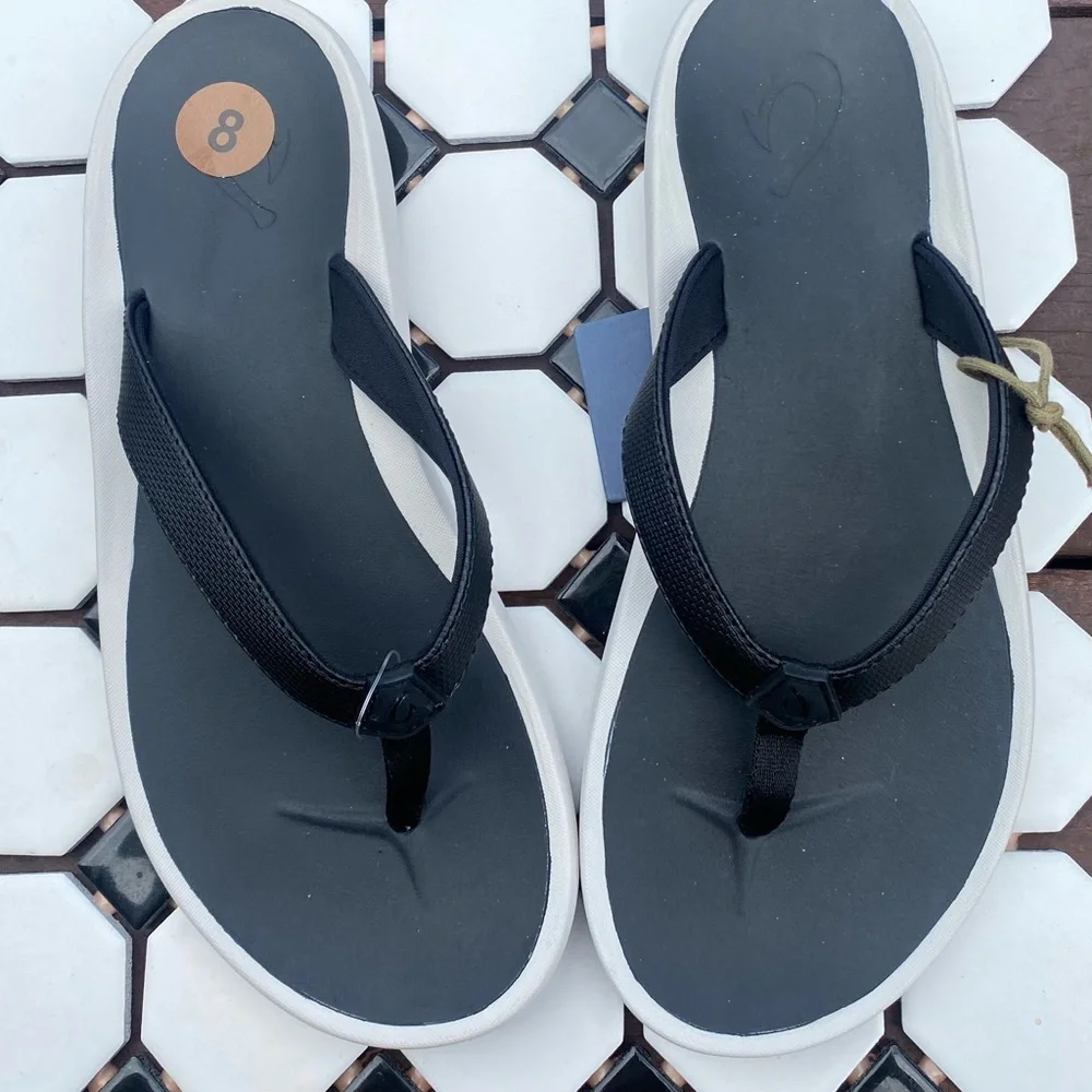 OluKai Black and White Women's Flip Flop Sandals
